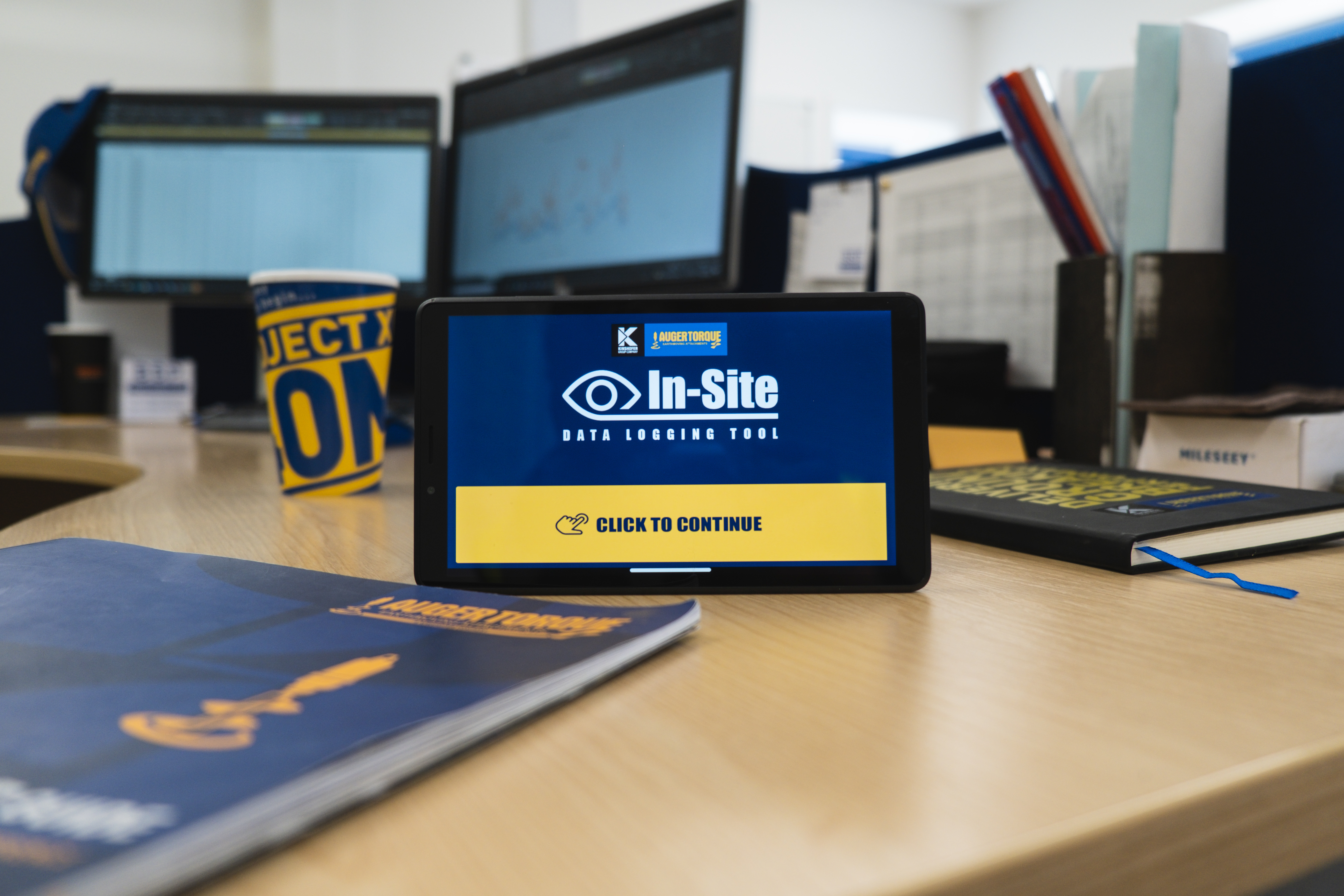 In-Site Tablet welcome screen on desk
